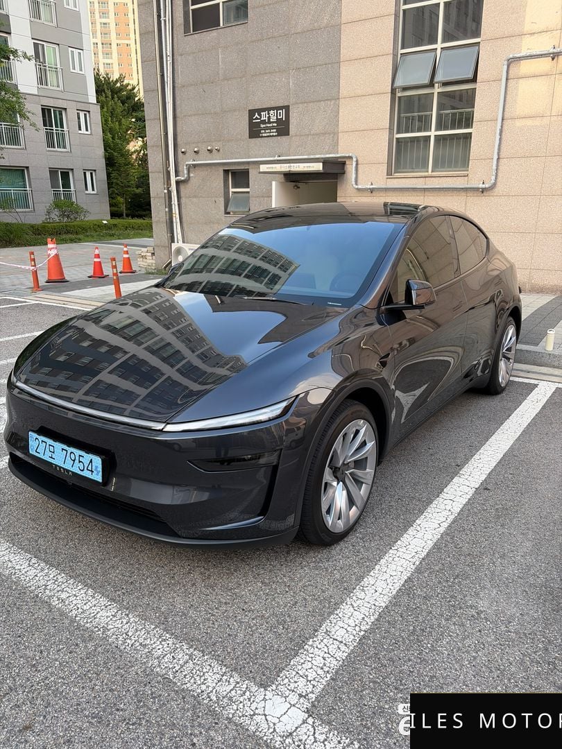 Tesla Model Y 2025 — фото 1 из 12